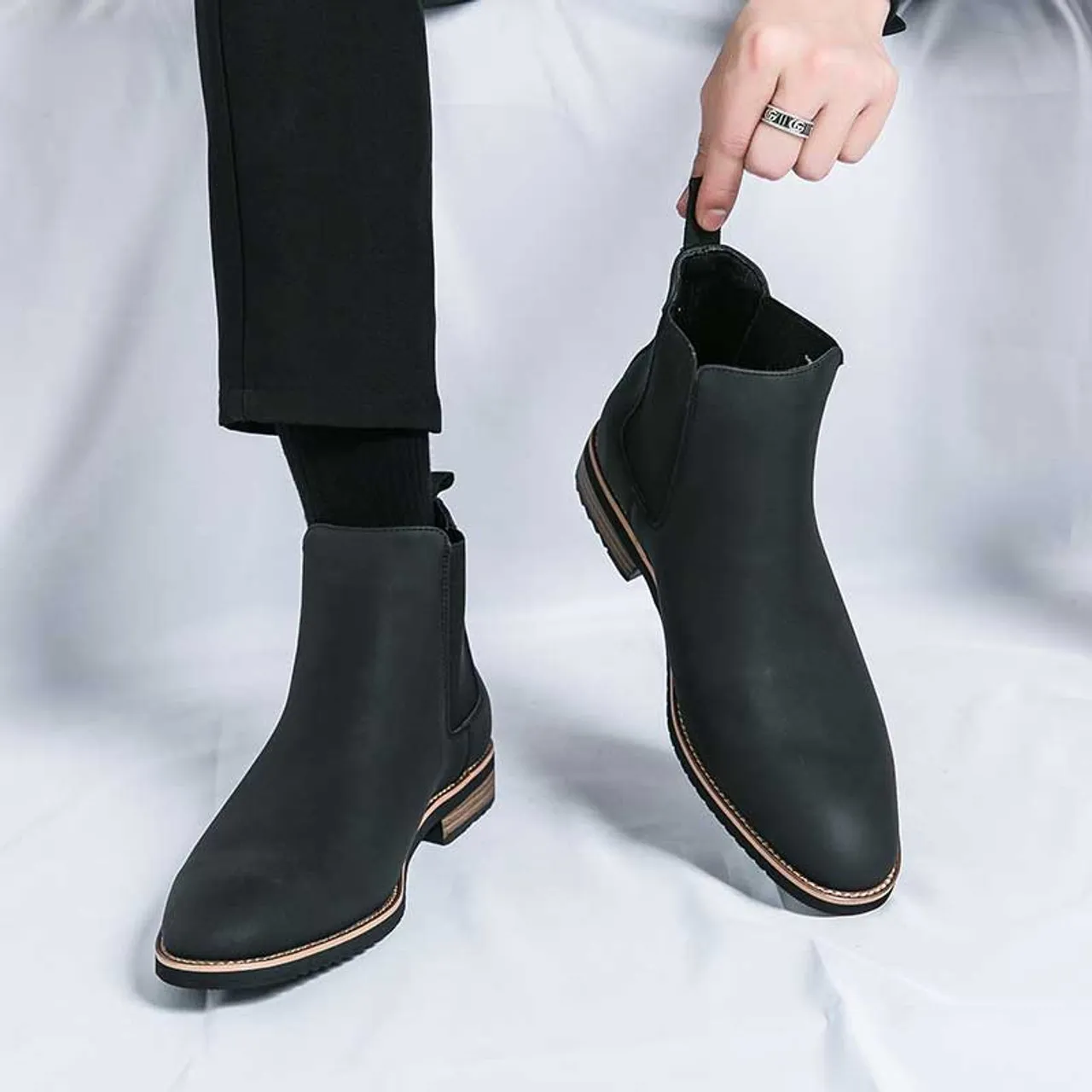 Black plain sewn accents slip on shoe boot