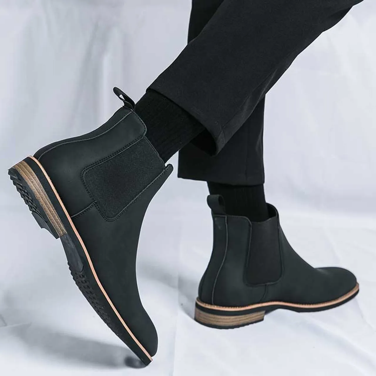 Black plain sewn accents slip on shoe boot