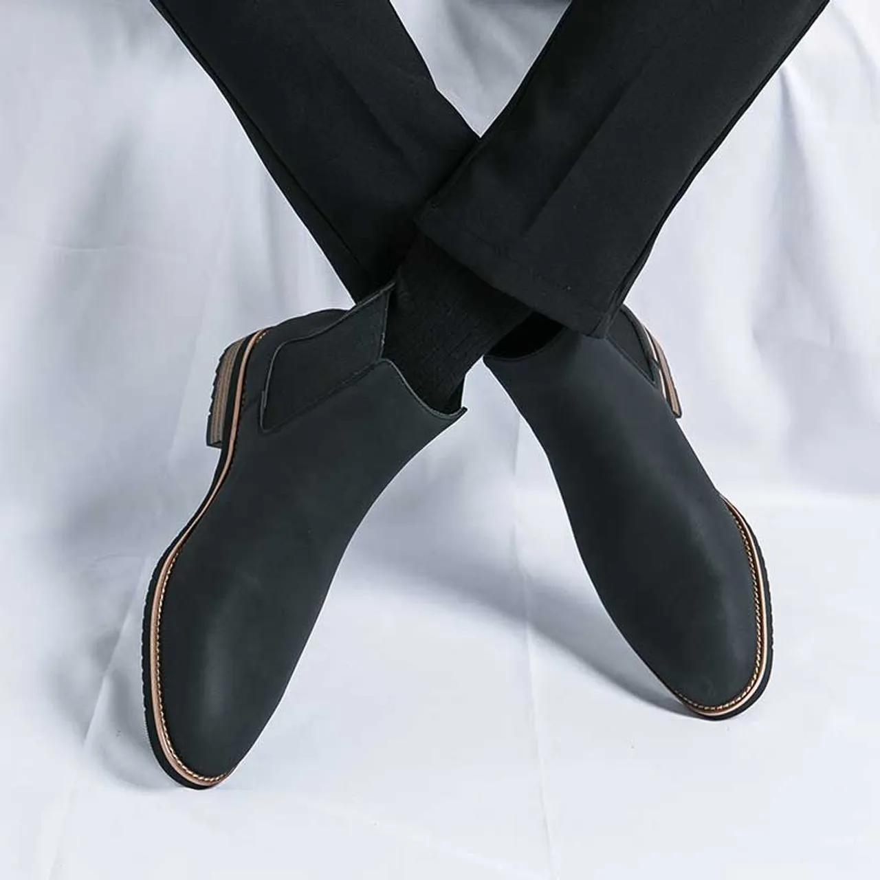 Black plain sewn accents slip on shoe boot