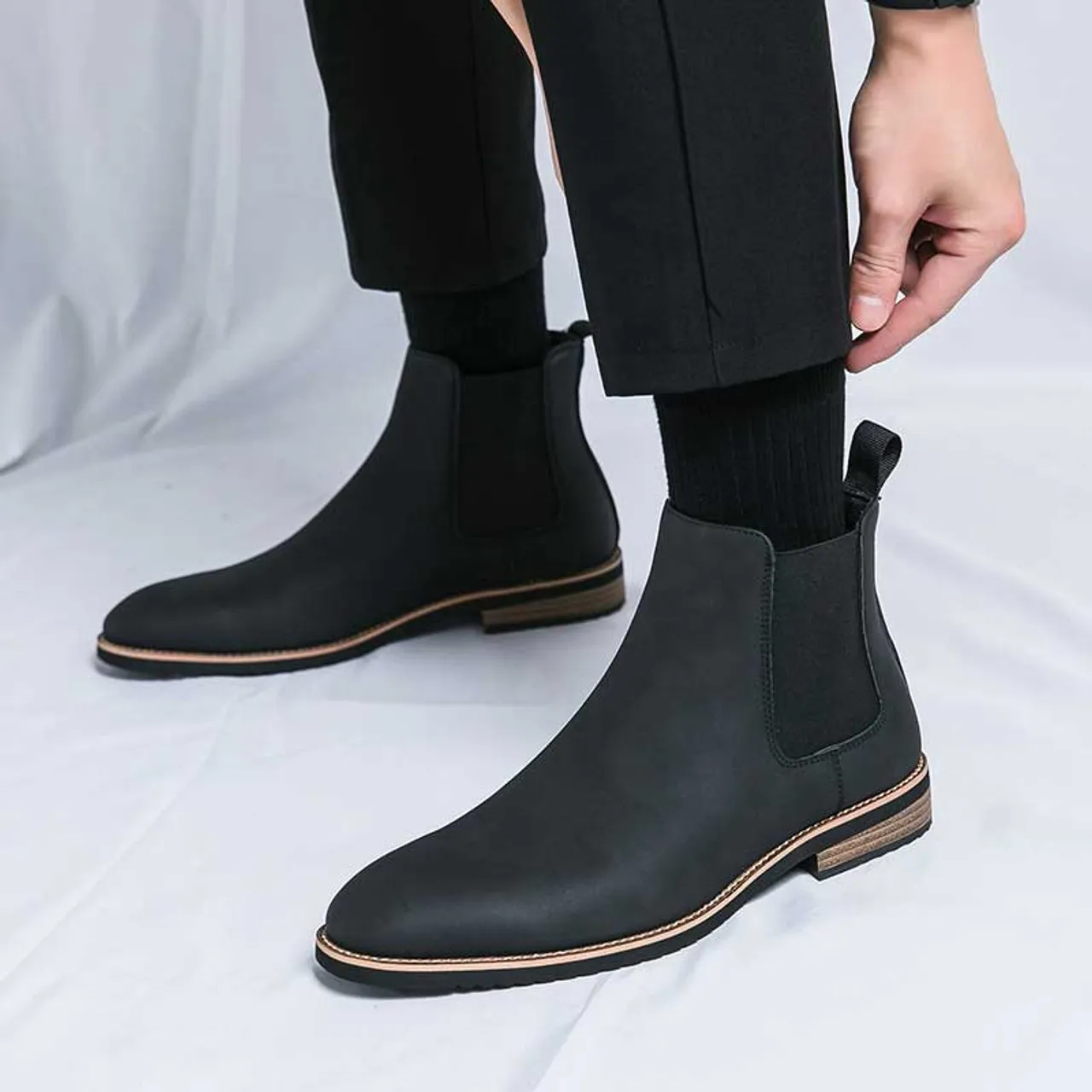 Black plain sewn accents slip on shoe boot