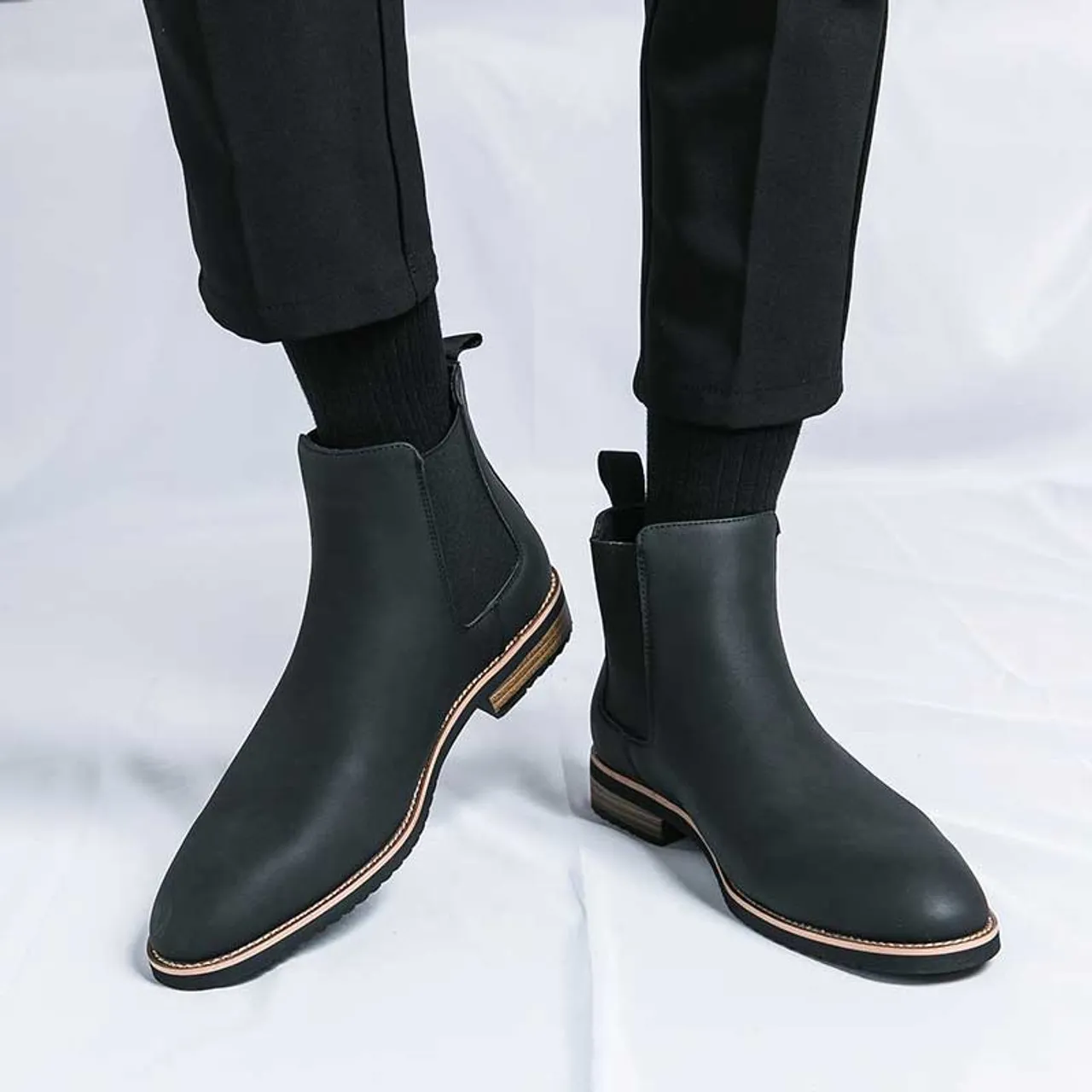 Black plain sewn accents slip on shoe boot