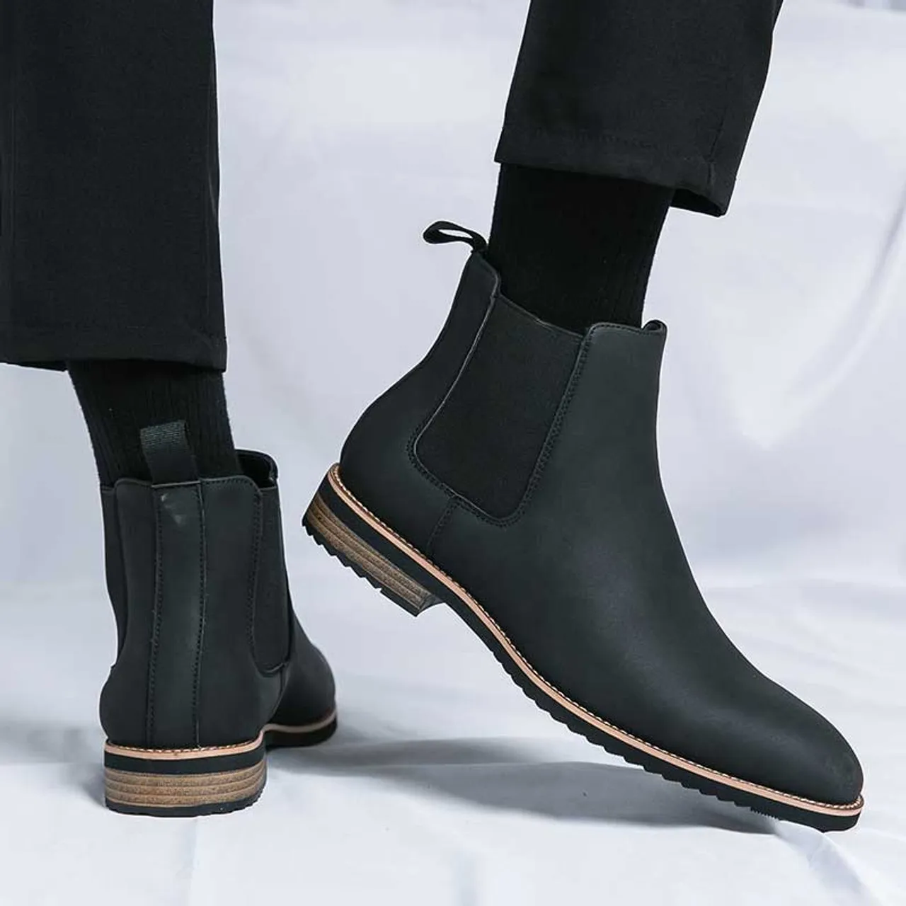 Black plain sewn accents slip on shoe boot