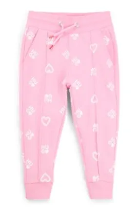 Kids' tracksuit bottoms with hearts and logos